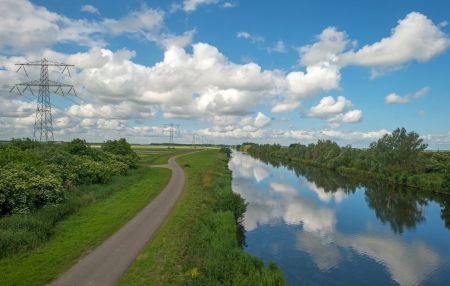 Reflection of clouds in a canalの写真素材