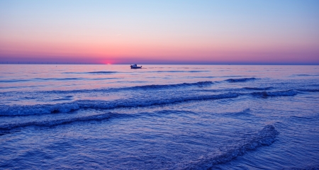Blue sunset at sea in summerの写真素材