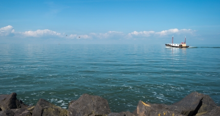 Trawler on a lake in summerの写真素材