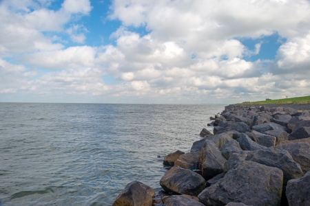 Dike along a lake in summerの写真素材