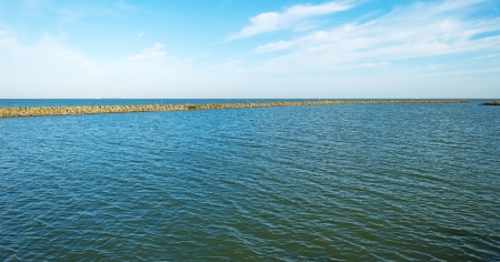 Dike in a lake in autumn