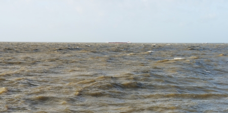 Barge sailing in stormy weather