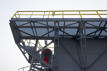 Footbridge over a river in summerの写真素材