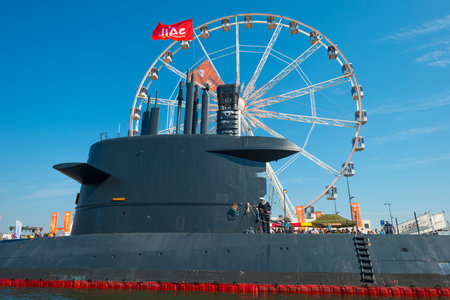 Submarine and ferris wheel in the harbor of Amsterdamのeditorial素材
