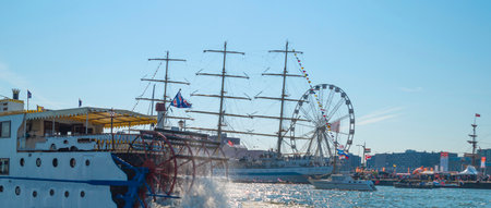 Ships sailing or mooring in the harbor of Amsterdamのeditorial素材