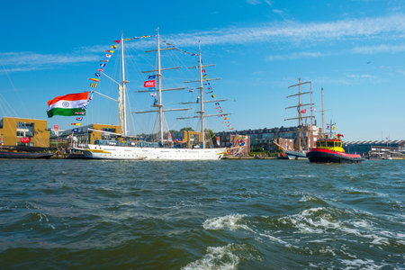 Ships sailing or mooring in the harbor of Amsterdamのeditorial素材