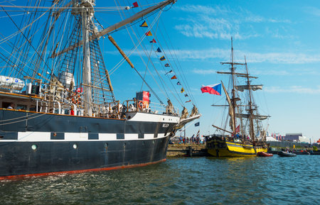 Ships sailing or mooring in the harbor of Amsterdam