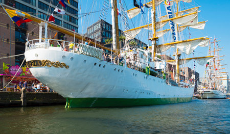 Ships sailing or mooring in the harbor of Amsterdamのeditorial素材