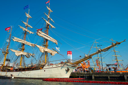 Ships sailing and mooring in the harbor of Amsterdamのeditorial素材