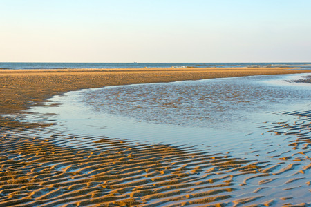 Blue sky on a beach along the North Sea