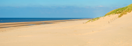 Sunlight on a beach along the North Seaの写真素材