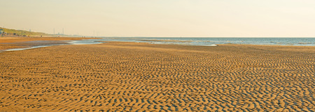 Sunlight on a beach along the North Seaの写真素材