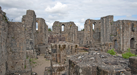 Ruin of an ancient abbey in sunlightの写真素材