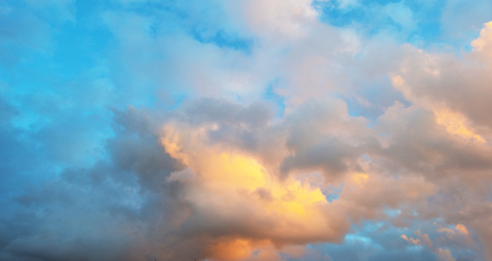 Clouds in a sunny blue sky in winterの写真素材