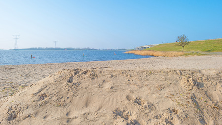 Beach along a lake in winterの写真素材