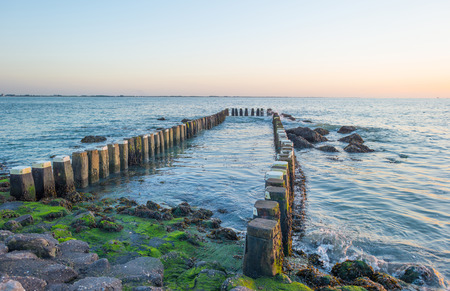 Breakwater to sea in summer