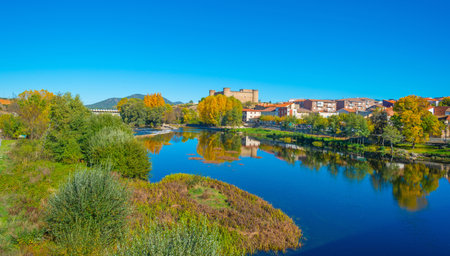 Castle along a river in sunlightのeditorial素材