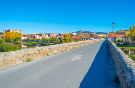 Medieval bridge over a river in sunlightのeditorial素材