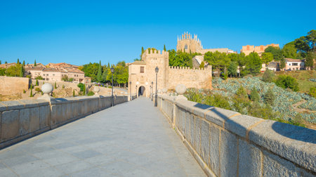 Medieval bridge over a river in Toledoのeditorial素材