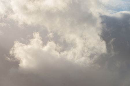 Clouds in a gray sky in spring