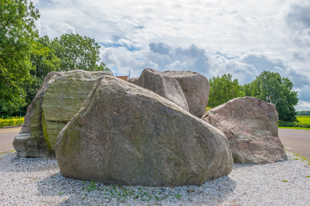 Ancient rocks once left by a glacier near a settlementの写真素材