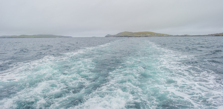 Panorama of the coast of an irish island at the atlantic ocean in summerの写真素材