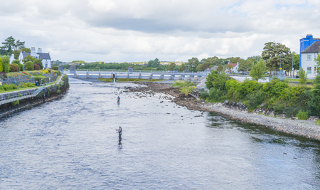 River through the city of Galway in Ireland in summerの写真素材