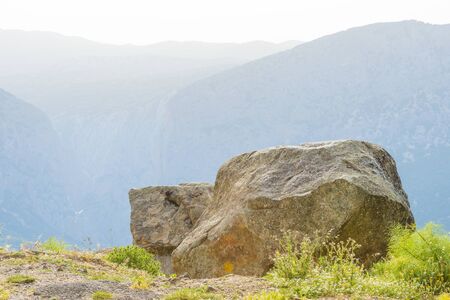 Scenic landscape or green hills and rocky mountains or the island of Sardinia in spring