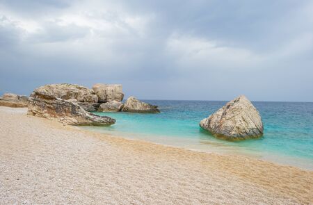 Beaches of the island of Sardinia in the Mediterranean Sea in sunlight in springの写真素材