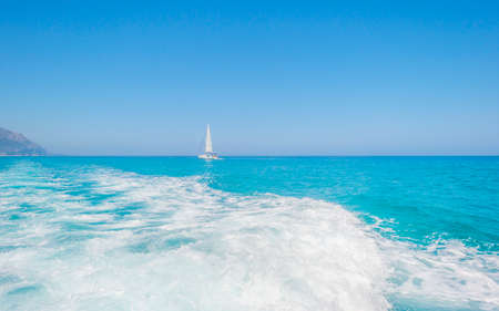 Rocky coast of the island of Sardinia in the Mediterranean Sea viewed from a boatの写真素材