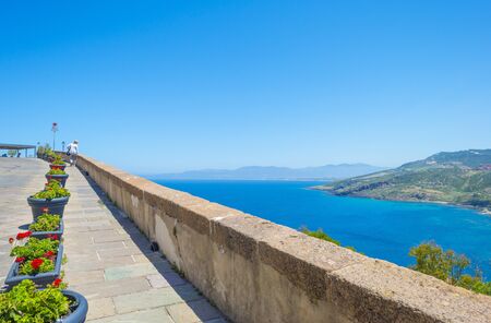 Rocky coast of the island of Sardinia in the Mediterranean Sea in sunlight in springの写真素材