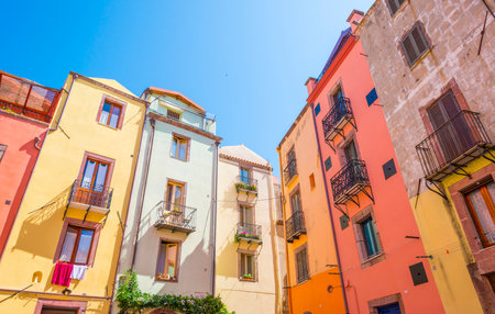 Colorful houses in the alleys of the town of Bosa in Sardinia in sunlight in springのeditorial素材