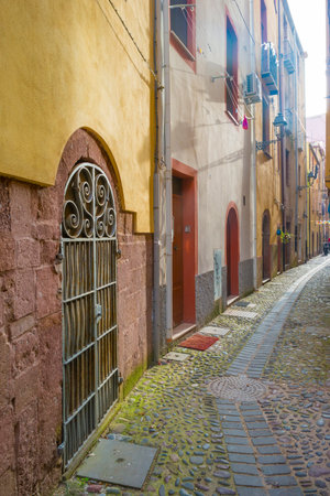 Colorful houses in the alleys of the town of Bosa in Sardinia in sunlight in springのeditorial素材