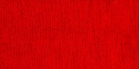 The brilliance of a sparkling red canvas lit by the sun at a spring day as a decorative backgroundの写真素材