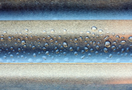 abstract composition of waterdrops over metal surface, copy spaceの写真素材