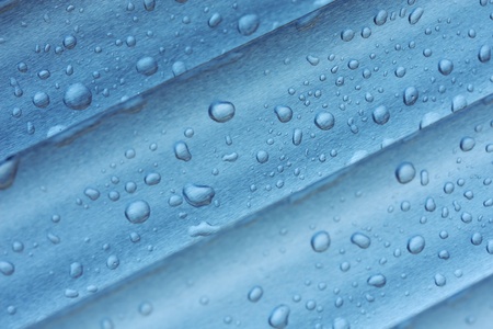 abstract composition of water-drops over metal surface