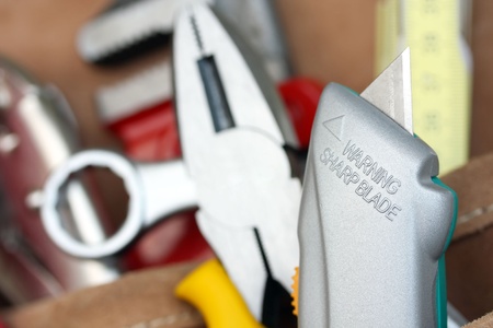 sparp, open paper knife with warning sign on itの写真素材