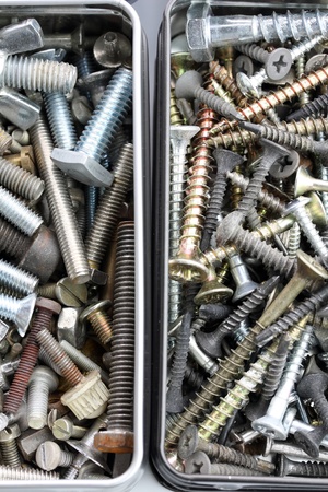 two boxes full of bolts and nuts,  different condition and sizeの写真素材