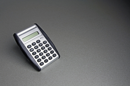calculator on grey surfaceの写真素材