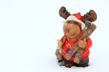 Rudolph, Santa Claus dear holding ski