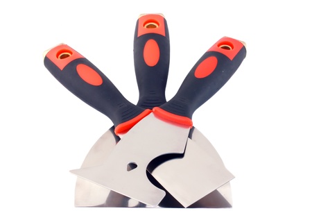 three putty-knifes isolated on whiteの写真素材