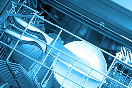 Dishwasher after cleaning process, blue toneの写真素材