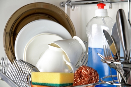 clean dish-ware, detergent and spongeの写真素材