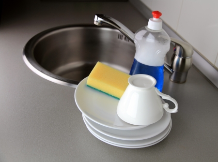 clean dish-ware, detergent and spongeの写真素材
