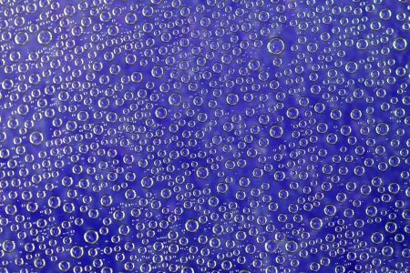 condensation bubbles on blue の写真素材