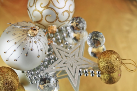 Christmas baubles, Cristal sphere and star golden background with reflectionsの写真素材
