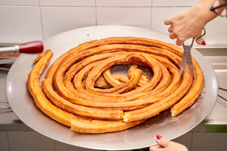 Spanish churros and porras thread before cutting. Churros. Porras. High quality photo
