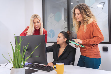 Professional businesswomen talking about work while meeting in the office. Business concept.の写真素材