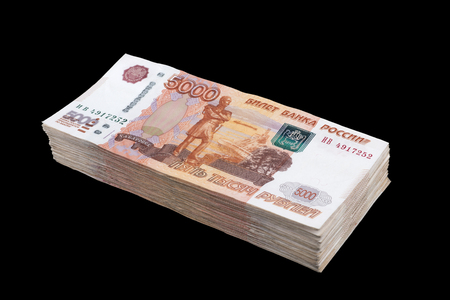 Bundle of banknotes of five thousand Russian rubles on black backgroundの写真素材