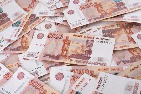 Heap of five thousand russian rubles banknotes as backgroundの写真素材